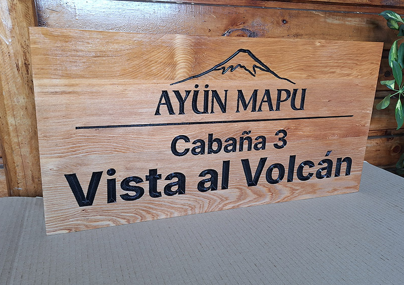 Ayün Mapu — Letrero tallado en mañío.